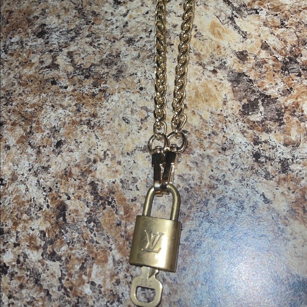 LV lock necklace